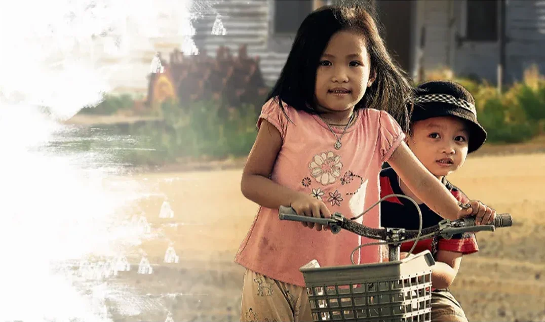 kids on bike First Nation Growers
